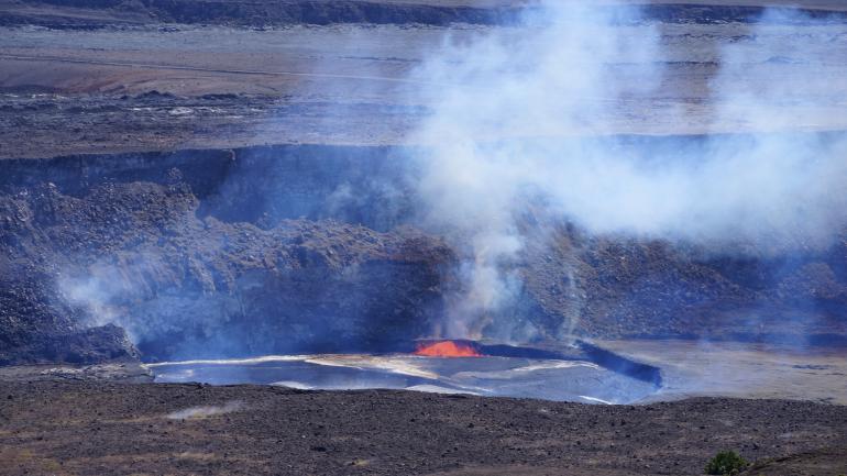 Steam rising from a crater in Hawaiʻi Volcanoes National Park Steam rising from a crater in Hawaiʻi Volcanoes National Park
